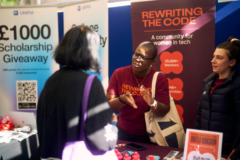 Rewriting the code brand rep talking to a student.